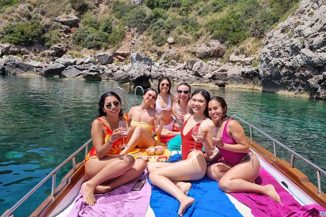 Sicilian wine tasting on the boat in Taormina - Exploring the Bay of Spisone’s Rock Formations