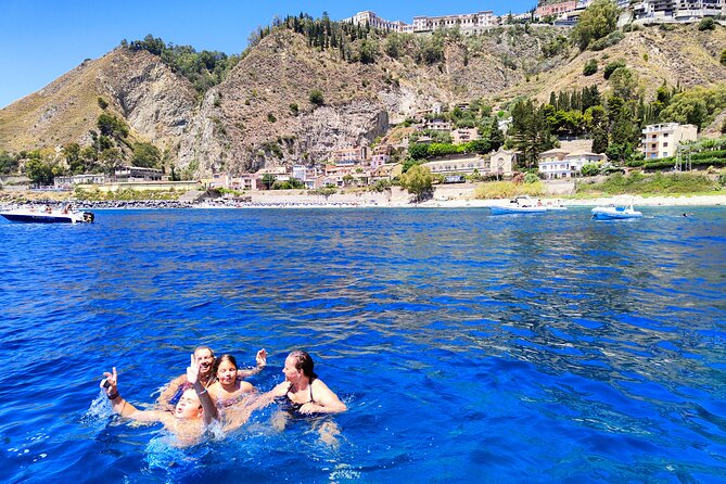 Sicilian wine tasting on the boat in Taormina - The Hidden Charm of Porto Baia delle Sirene