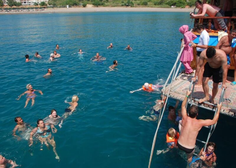 Side: Dolphin Boat Tour With Lunch Foam party Swimming - The Experience Provider and Booking Flexibility
