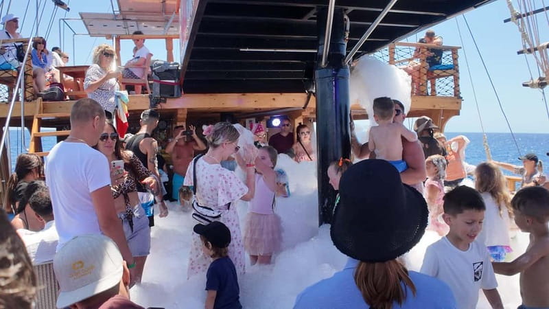 Side: Dolphin Boat Tour With Lunch Foam party Swimming - The Unique Charm of This Dolphin Boat Tour