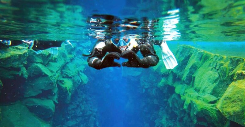 Silfra: Fissure Snorkeling Tour with Underwater Photos - Thrilling Tectonic Plate Snorkeling in Þingvellir National Park for $169
