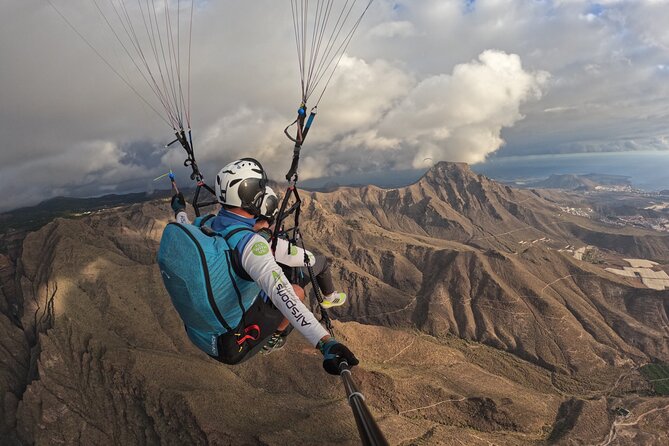 SILVER 1000m paragliding tandem flight above South Tenerife - Included Equipment, Insurance, and Practical Tips