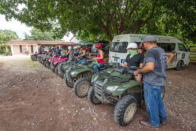 Single ATV, Ziplines, Horseback and Waterfall with Open Bar - Single ATV Ride Across Rugged Mountain Terrain