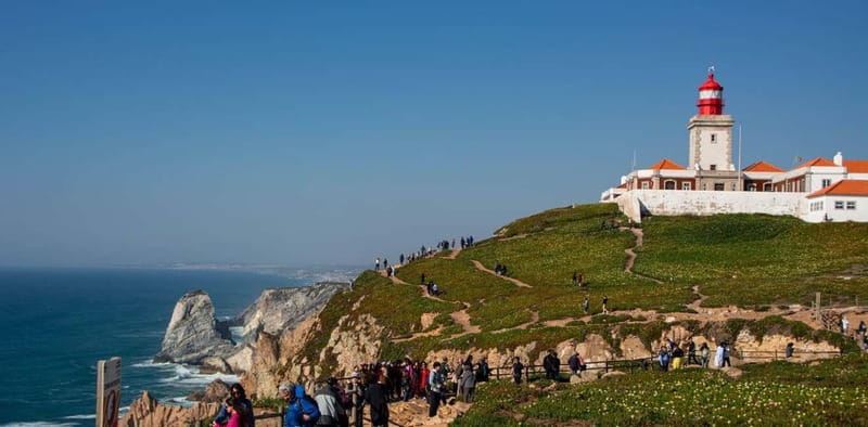 Sintra: Pena Palace & Coastal Wonders Day Tour with Tickets - Discovering the Glamorous Coastal Town of Cascais