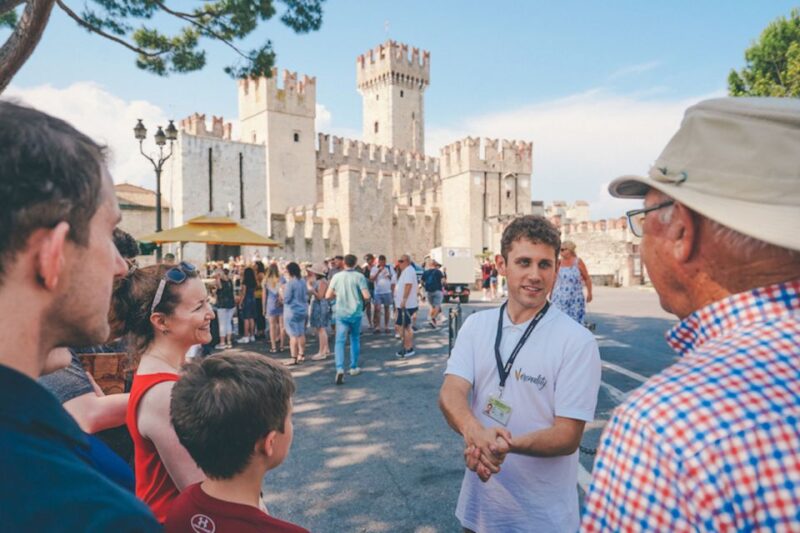 Sirmione: Village Highlights Walking & Lake Garda Boat Tour - Sirmiones Charming Streets and Local Secrets