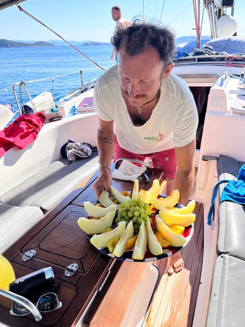 Skiathos: day sailing trip with swim stops and lunch - Exclusive Swim and Snorkel Stops in Secluded Locations