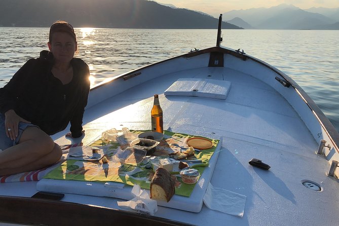 Slow boat tour for small groups with appetizer on Lake Maggiore - On-Board Aperitivo: Wine and Snacks with a View