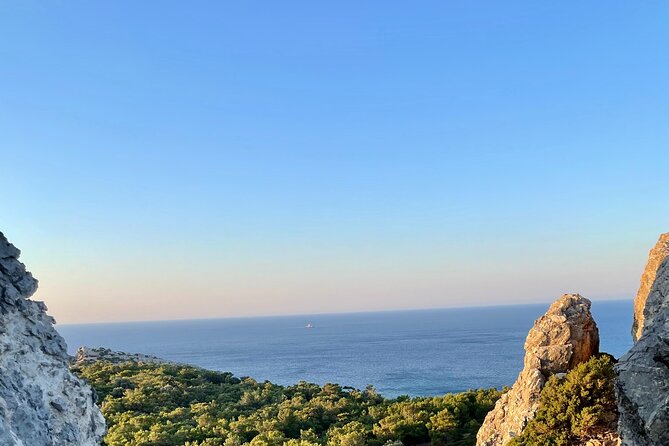 Small group hiking from Pefkos to Navarone Bay at sunrise - Descending Through the Pine Forest and Coastal Path