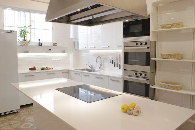 Small Group Tapas and Paella Cooking Class in Madrid - Key Points