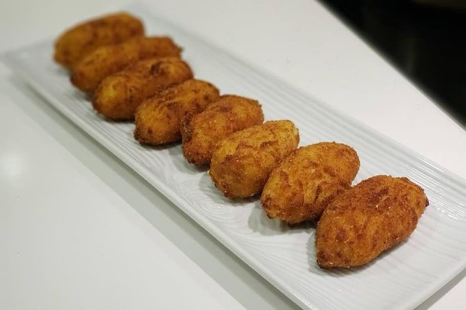 Small Group Tapas and Paella Cooking Class in Madrid - Pricing, Booking, and Cancellation Policies