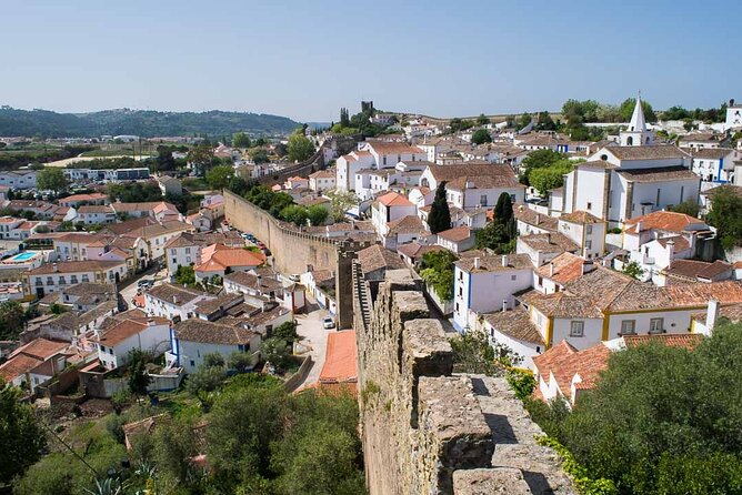 SMALL GROUP(2-6pax) Lisbon to Obidos+Fatima+Nazare) PRIVATE TOUR - Weather and Cancellation Policies