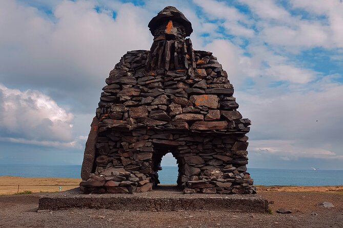 Snæfellsnes Peninsula Private Tour Iceland - Admiring the Gigantic Londrangar Basalt Cliffs