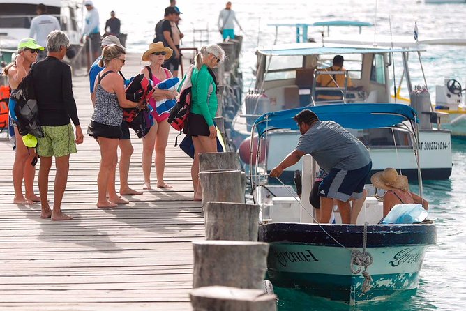 Snorkel in the turquoise Caribbean Sea in Puerto Morelos. Transport included - Guided Walking Tour of Puerto Morelos’ Charming Streets