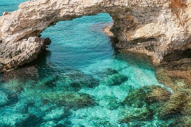 Snorkeling and Sailing In Cretes Hidden Coastal Gems - Malia Beach: Shallow Waters and Sandy Shores