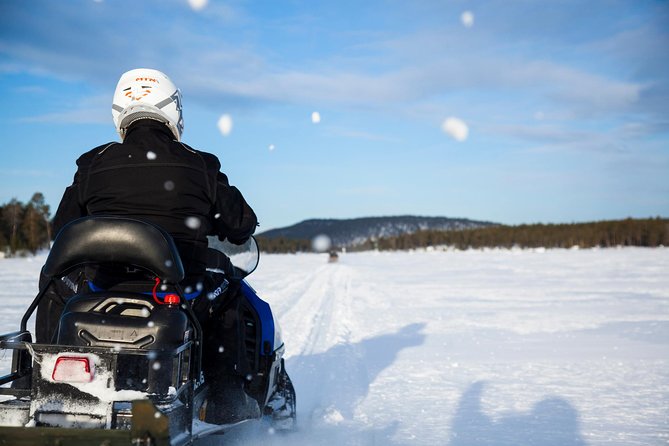 Snowmobile Safari to Lake Inari, meet & feed Reindeers, Lunch - Hotel Pickup and Easy Access to the Wilderness