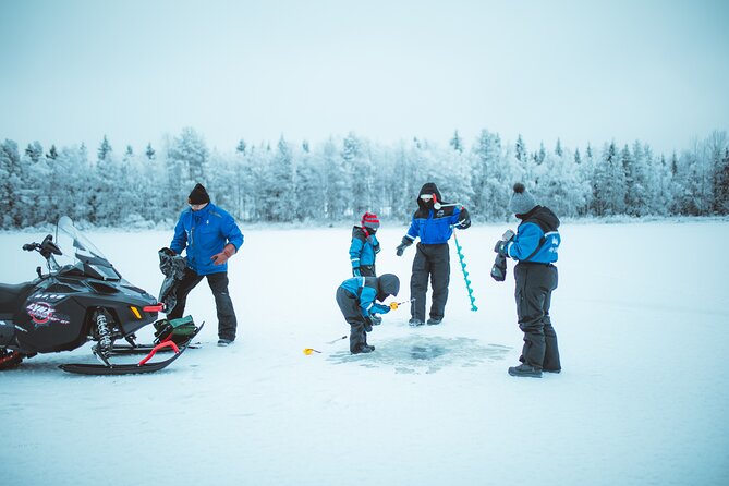 Snowmobiling and ice fishing in Apukka Resort, Rovaniemi - Cozy Bonfire and Warm Refreshments