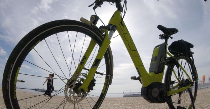 South Lisbon: 3-Hour Christ the King Electric Bike Tour - Climbing to the Christ the King Sanctuary