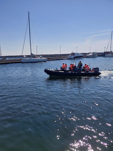 Speed boat at the end of the pier in Sopot. Speed 90 km/h - The Safety and Comfort of the Well-Trained Crew