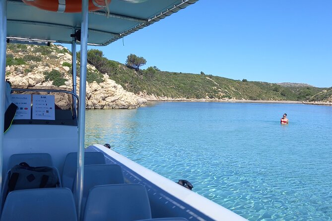 Speedboat excursion through the coves of northern Menorca - Marine Life and Untouched Beauty at Cala Pudent