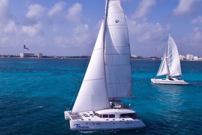 Spinnaker Isla Mujeres Catamaran Tour with Snorkeling and Lunch - Sailing and the Spinnaker Experience