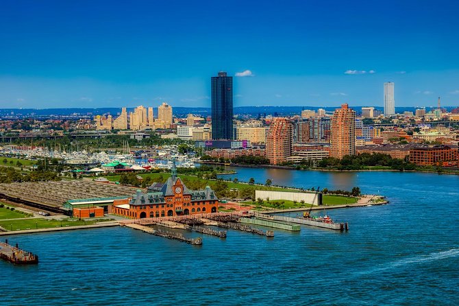 Statue of Liberty Sunset Cruise and New York City Sky Line - Spectacular Views and Iconic Landmarks from Manhattan Waters