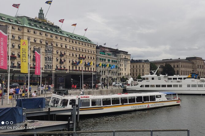 Stockholm- A Beauty On The Water: Old Town Walking Tour and Boat Trip Combined - The Royal Palace and Historic Statues at Slottsbacken