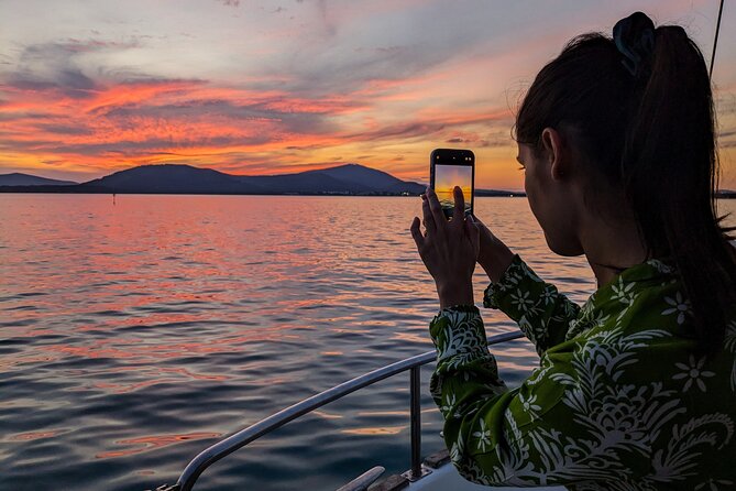 Sunset and Aperitif on a Sailing Boat in Alghero - Experience an Elegant Sunset Cruise in Alghero with Aperitifs and Swimming