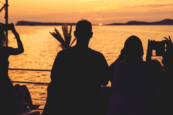 Sunset Beach Hopping Cruise, Cala Comte and Cala Bassa, SUP and snorkelling - The Sunset Experience and Music Atmosphere