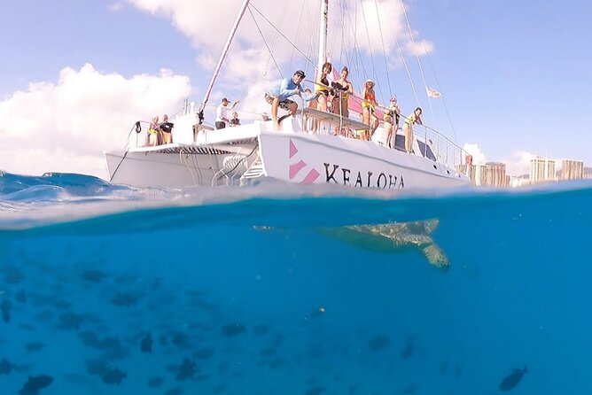 Sunset Boat Cruise: Swim and Cruise Waikiki - Family-Friendly and Solo Options
