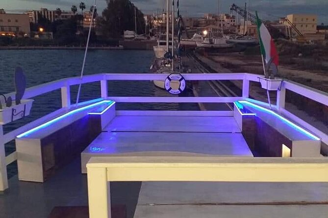 Sunset boat tour with aperitif and swimming break - Key Points