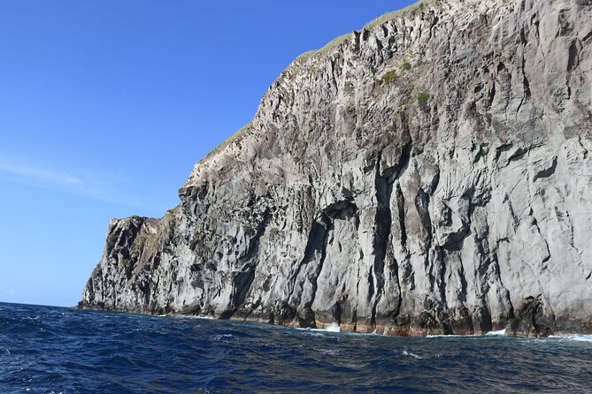 Sunset boat trip in Ponta do Cintrão - Passing Imposing Headlands and Headlands’ Unique Features