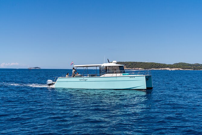 Sunset Catamaran Tour from Old Town Dubrovnik - Savoring Sparkling Wine and Capturing Photos