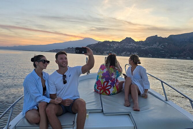 Sunset Cruise Taormina Private - Spisone Beach with Its Overhanging Rocks and Pebbled Shore