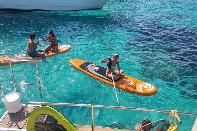 Sunset cruise with snack & wine from Argostoli - Xi Beach: Soft Red Sand and Clear Waters for Swimming and Snorkeling