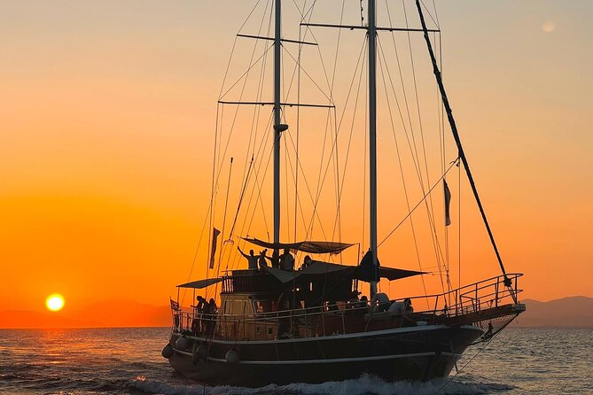 Sunset Dinner Cruise: Sunset, Swim, Drinks, and Dinner Onboard - Key Points