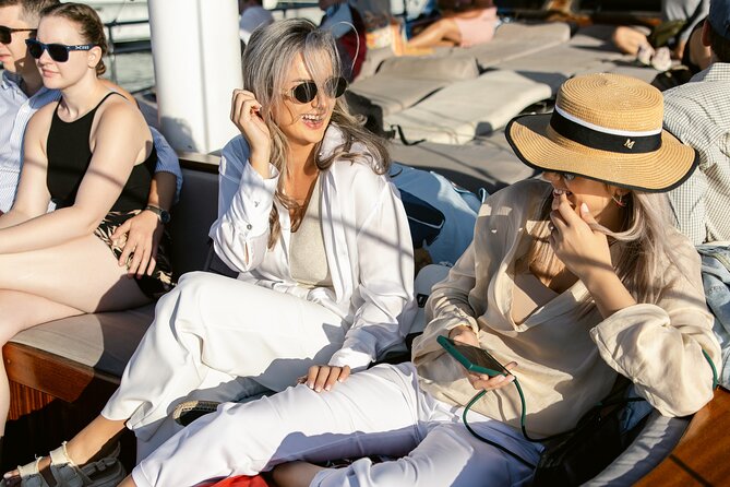 Sunset Dinner Cruise: Sunset, Swim, Drinks, and Dinner Onboard - Relaxing on the Wooden Boat: Comfort and Atmosphere