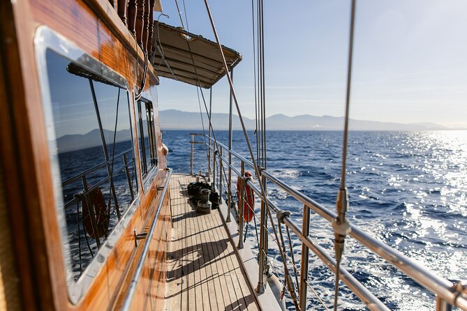 Sunset Dinner Cruise: Sunset, Swim, Drinks, and Dinner Onboard - Weather Considerations and Cancellation Policy