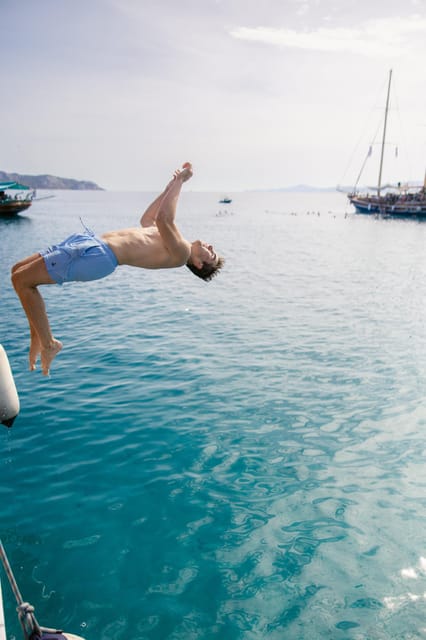 Sunset Dinner Cruise: Swim Stop, Drinks & Onboard Dining - Key Points