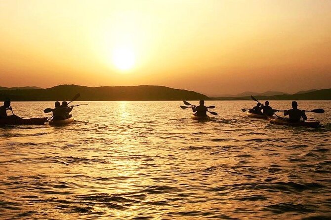 Sunset Kayak Tour with Snorkeling and Local Aperitif - Key Points