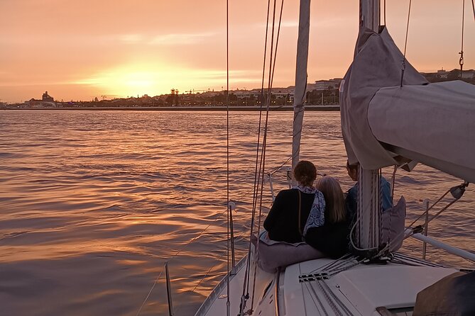 Sunset sailing boat trip in Lisbon with snacks - Key Points