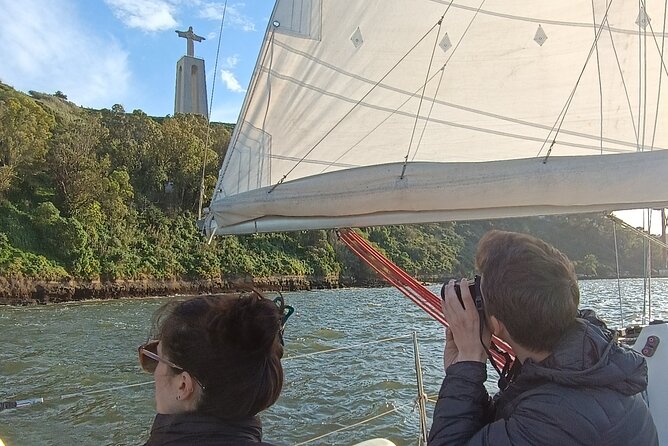 Sunset sailing boat trip in Lisbon with snacks - The Crew: Warmth and Knowledge