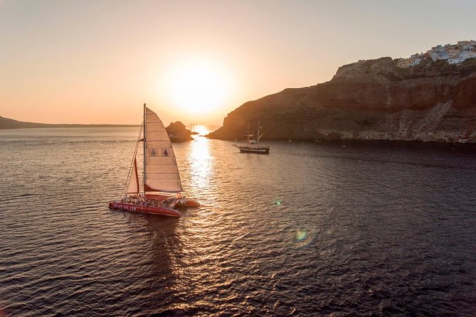 Sunset Sailing Catamaran Cruise in Santorini with BBQ and Drinks - Starting from Ammoudi or Athinios Port for Scenic Sailing