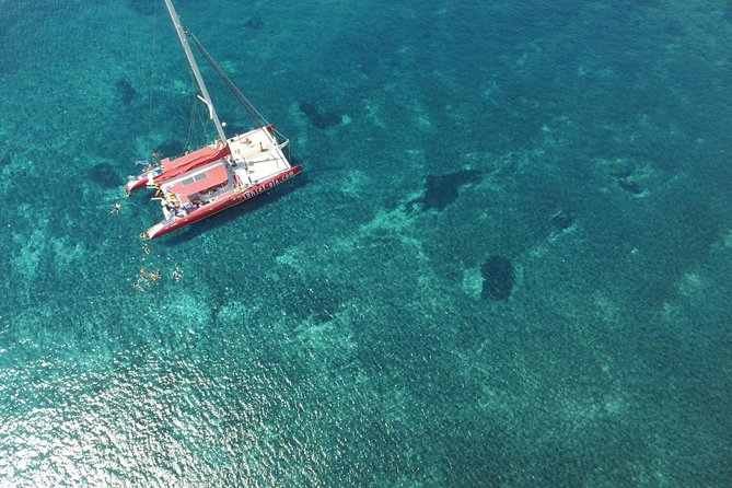 Sunset Sailing Catamaran Cruise in Santorini with BBQ and Drinks - The Crew and Atmosphere Aboard
