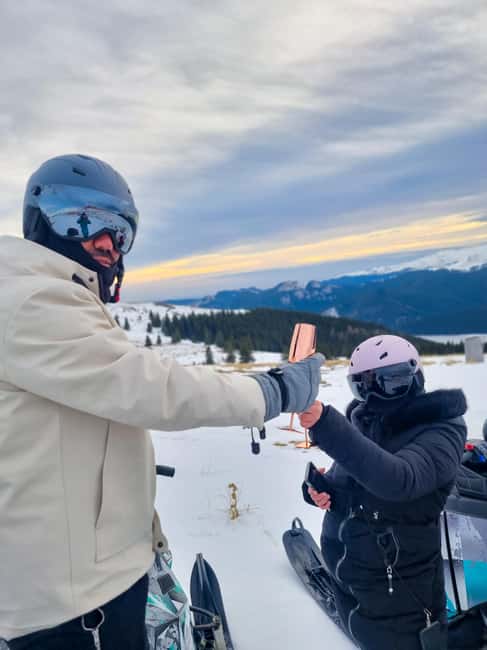 Sunset, Snowmobile, Champagne and You in Bucegi Mountains - The Delivery and Expertise of Winter Sports Instructors Sinaia