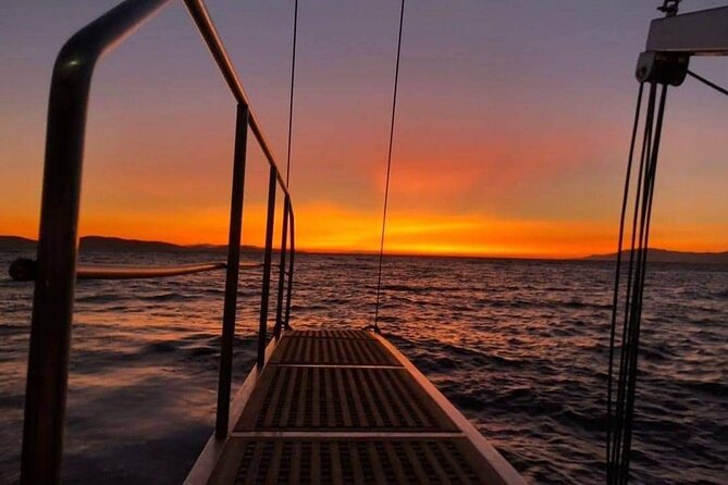 Sunset South Coast Sail Cruise with lunch,drinks, optional transfer - Watching the Mykonian Sunset from the Boat