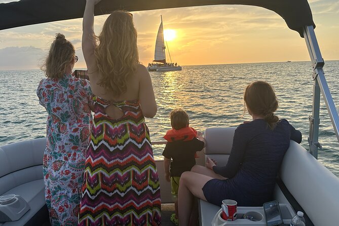 Sunset Tour in Naples Bay on a New Godfrey- All included - The Guide: Captain Tyler and the Marine Experience