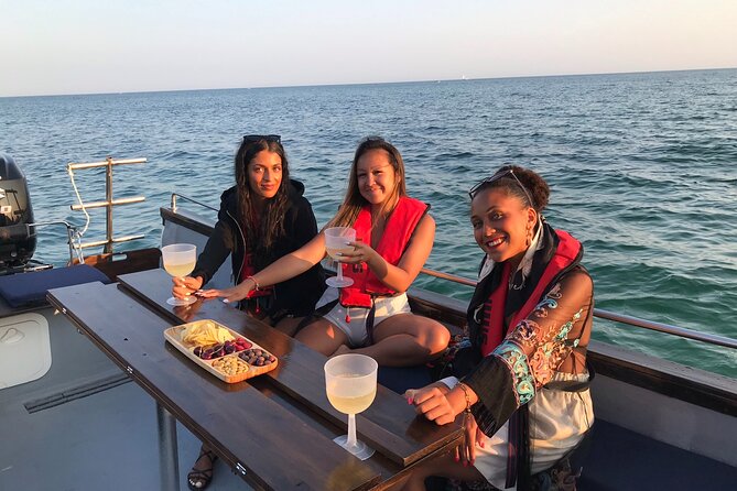 Sunset trip - Enjoying Light Snacks, Wine, and Canapes on Board
