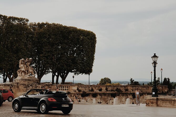 Surprise Walk of Montpellier with a Local - Discovering Hidden Figures in Place Édouard Adam