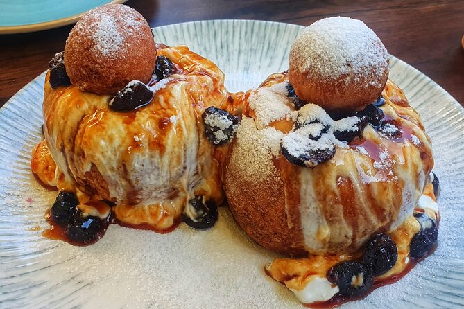 Sweet Delights History and Desserts Walking Tour in Bucharest - Admiring French-Style Architecture on Calea Victoriei