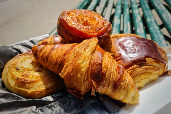 Sweet walking food tour in Paris with local guide - Savoring Cream Puffs at Odette